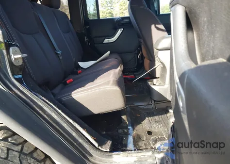 2014 Jeep Wrangler Unlimited Rubicon z USA, uszkodzony, nr VIN 1C4HJWFG2EL157963